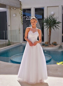 Products: Talcott Madison Rose Bridal Affordable high neck with sparkle tulle and strikingly beautiful back detailing