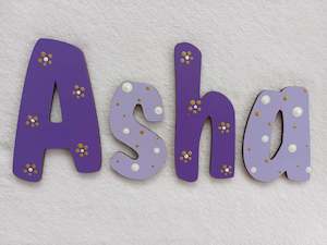 Asha - small letters suitable for a door.