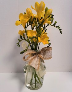 Florist: Freesias in Glass