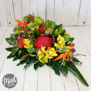 Florist: Funeral Casket Floral Arrangement - Bright