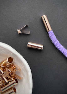 Dressmaking supply: Gold Metal Cord End