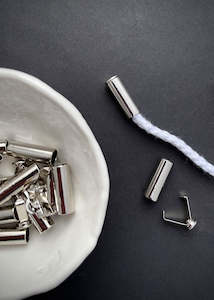 Dressmaking supply: Silver Metal Cord End