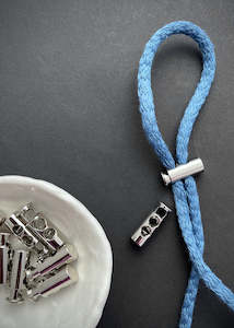 Dressmaking supply: Silver Cord Lock