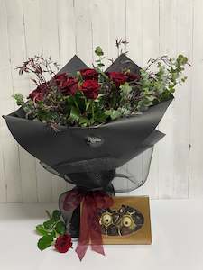 Florist: Dramatic Dozen Red Roses with Van H chocolates