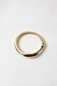 Womenswear: orb bangle / gold