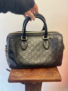 Clothing: Gucci embossed Black Gucci Bowler Bag RRP $6000