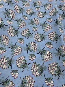 100% Patterned Dress Cotton – CT7 – Powdered Blue background with a spray of…