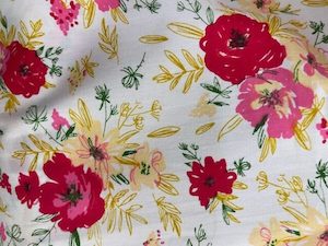 Products: Dress Cotton – Flower Garden – Pinks / Red / Creams on White – 100% Dress Cotton – 1.15cm wide per mtr