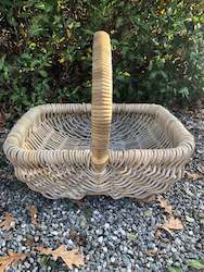 Homewares: Cane basket with handle