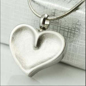 Hearts - My Angel Cremation Jewellery Cremation or Keepsake Jewellery and Urns for ashes: Pressing against my Heart