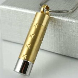 Jewellery: Gold X Cylinder