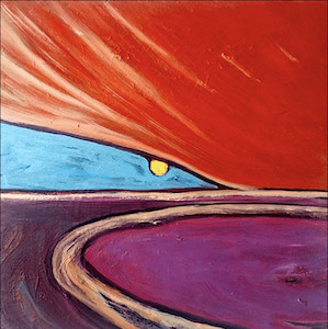 Small vibrant red sunset with purple sand