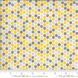 Honeycomb in yellows and greys on a white background