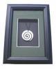 Framed bone koru