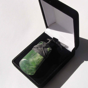 Greenstone Toki pendant