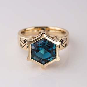 Eye of Horus / Eye of Ra ring with London Blue Topaz  in 9 carat Gold