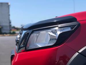 HEADLIGHT COVER - NAVARA