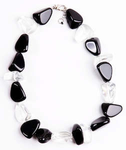 Clothing accessory: SSobral Design Brazil Resin Flintstone Bone Diamantes Necklace in Black & Clear