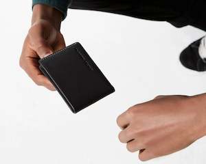 Gift: Status Anxiety | Otis Mens Leather Bi-Fold Wallet | Black