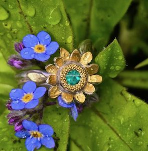 Jewellery: Bloom ring. 3.5mm Brazilian emerald, silver, 24ct and 18ct green gold. Size O 1/2. For Fingers 50th Anniversary Exhibition