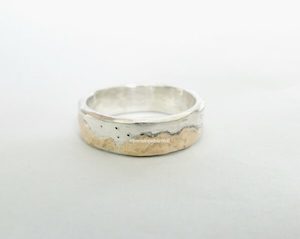 Dawn Chorus ring. silver and 9ct gold. Sold