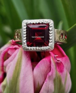 Square cut African garnet ring. sapphires, silver and 9ct rose gold. Size R