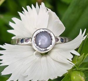 Star sapphire ring with sapphire band. silver and fine silver. Size O