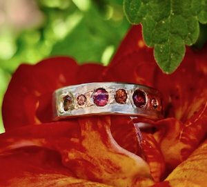 Wide Fire ring. silver, 14ct red gold and seven sapphires. Size S