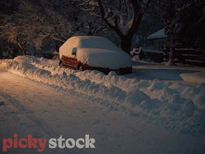 Snow covered car