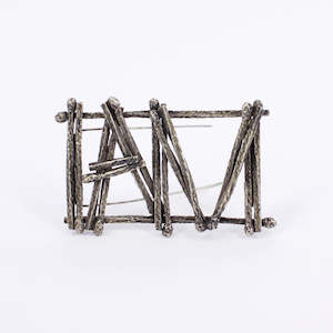 DM198B: I AM burnt matchstick brooch