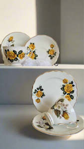 Gift: Royal Vale & Royal Sutherland Cup, Saucer & Side Plate with assorted teaspoons & cake forks