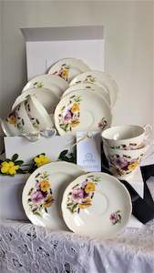 Regencey Cups, Saucers and Side Plates with assorted teaspoons & cake forks