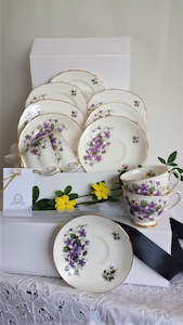 Colclough Cups, Saucers and Side Plates with assorted teaspoons & cake forks