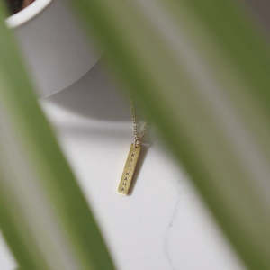 Homewares: GOLD KIA KAHA NECKLACE