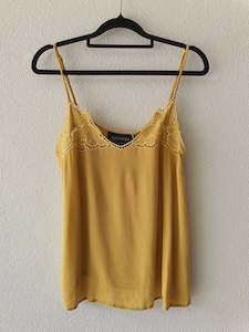 Decjuba Mustard Singlet Top 10