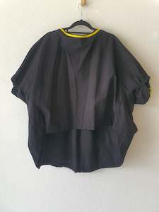 Second hand clothing: Black top with yellow stripes Medium/Large