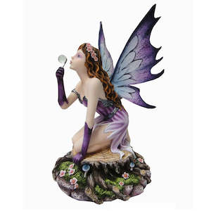 Fairy Sitting on Tree Stool