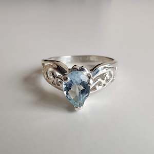 Internet only: Blue Topaz Tear Drop 925 Sterling Silver Ring with Koru Design