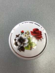 White Flower and Gold Knob