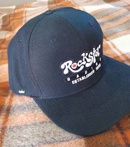 Clothing manufacturing - mens and boys: Snap back ball cap.