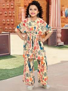 Sima Kurti With Palazzo Suit