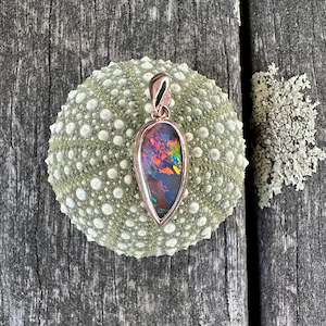 Fiery Boulder opal pendant