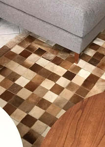 Carpet: Reddish And Beige Block Cowhide Patchwork Rug