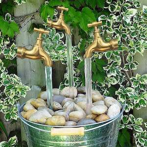 Pond Pump: Invisible Flowing Water Watering Can-fountain