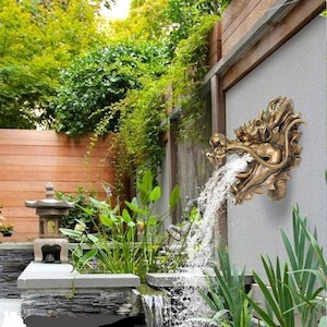 Pond Pump: Wall-mounted outdoor fountain/imitation stone carving faucet spouting nozzle/pool landscape water