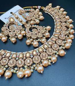 Jewellery: Jerkan stone with pearls beaded work beautiful necklace with earrings and tikka set