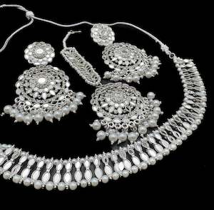 Jewellery: Silver color Beautiful mirror with pearls beaded necklace with earrings and tikka set