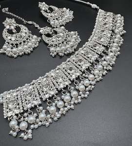 Jewellery: Silver color Beautiful jerkan stone with pearls beaded choker necklace with earrings and tikka set