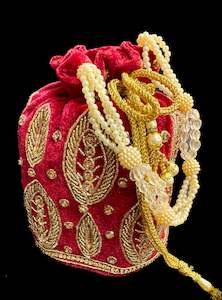 Velvet based pearls with stones  work hand bag /potli bag