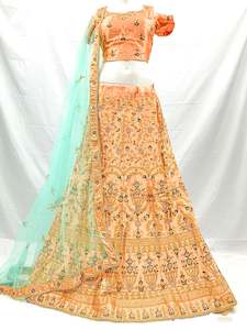 Casual Lehnga: Size 44(upto 48) Peach colour silk based heavy embroidery work on Blouse & Lehnga with heavy work netting dupatta